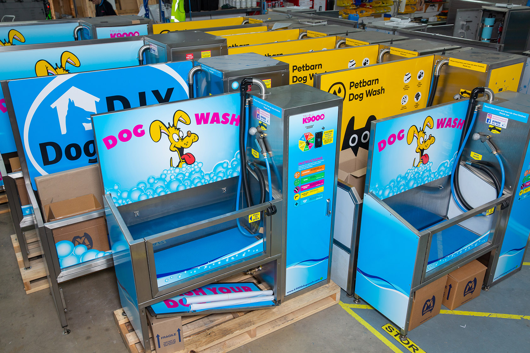 Newly made K9000 Dog Wash machines in a warehouse